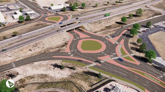 two roundabouts on either side of an underpass. They connected by a two lane road that goes under the underpass