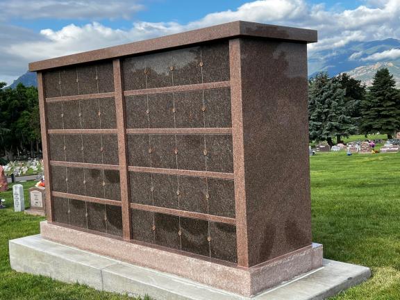 Photo depicting a dark brown columbarium 