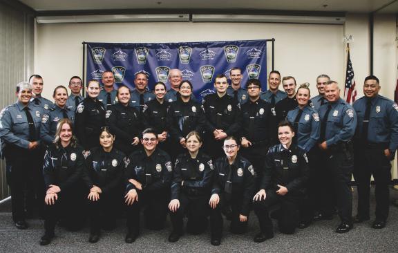 Group photo of teen cadets and police officers