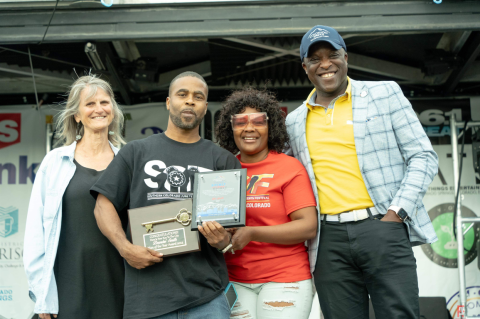 Mayor Yemi takes a photo with Dee Smith, who is holding his Mayor's Spirit of Colorado Springs Award, at the Southern Colorado Juneteenth Fesitval