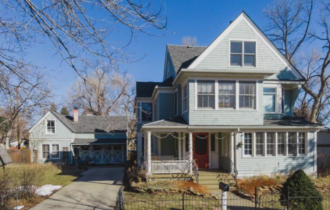 two story house with detached garage and auxiliary dwelling unit in back