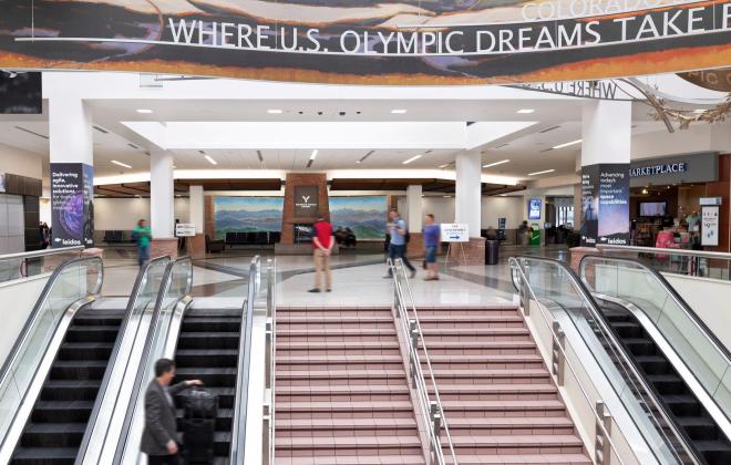 escalators at the entrance to the airport