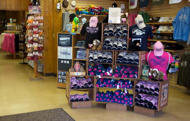 a t-shirt and hand stand inside the Glen Cove gift shop