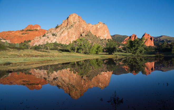 A picture of rocks at Garden of the Gods in front of water