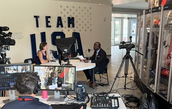 Mayor Yemi and Jen Schreuder sit at the USOPM to film a Behind the Springs Episode