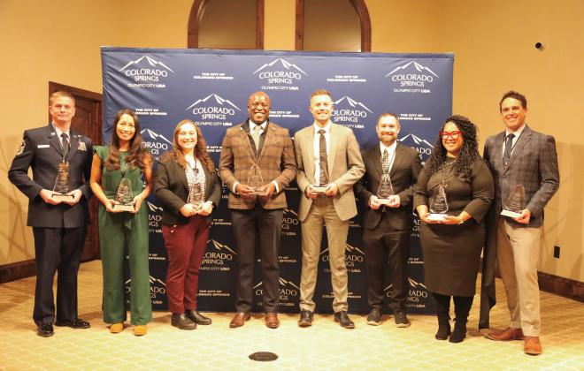 Mayor Yemi and the recipients of the 2025 Mayor's Young Leader Awards (from left to right): MSgt Connor Olney, Christina Lorete, Rachael Maxwell, Mayor Yemi, Preston Goff, Keith Bisaillon, Kimberly Gold and Samuel Clark.