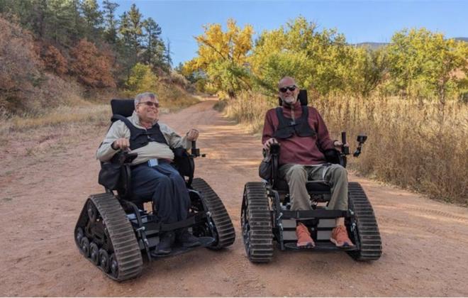 Two Colorado Springs residents use the new track chairs designed to help wheelchair users navigate terrain
