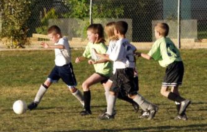 Kids playing soccer