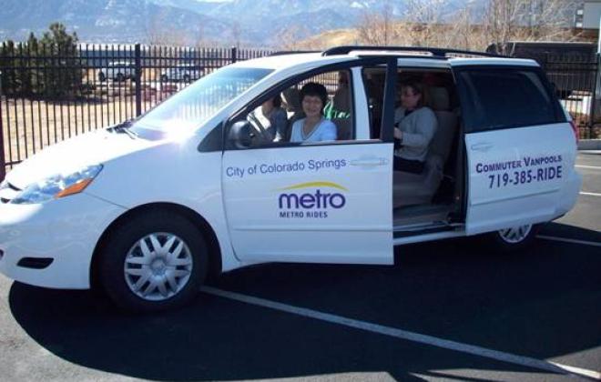 A passenger gets out of an MMT van