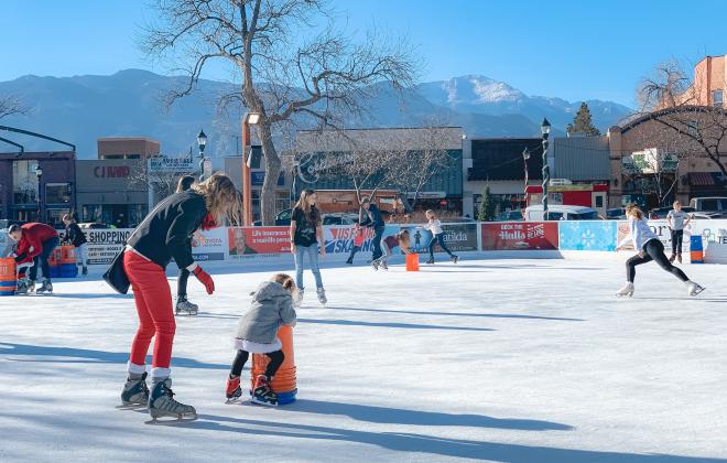 People iceskating in Acacia Park