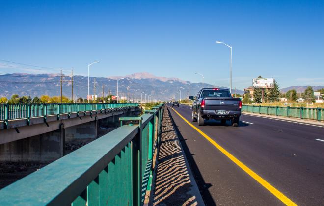 Platte bridge over Sand Creek looking towards Pikes Peak