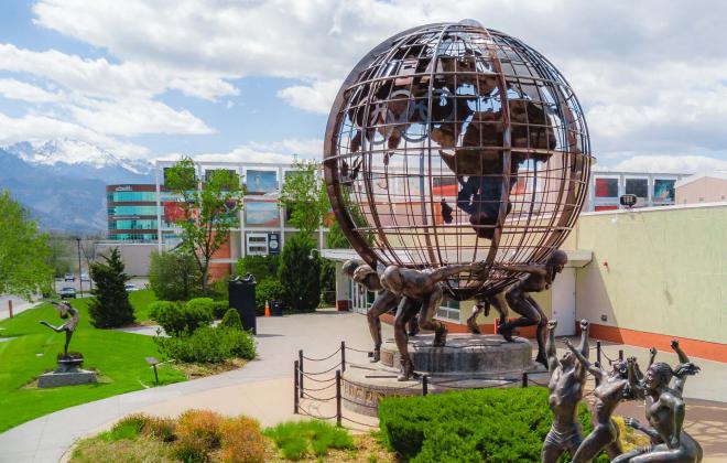 bronze globe sculpture at the U.S. Olympic and Paralympic training center